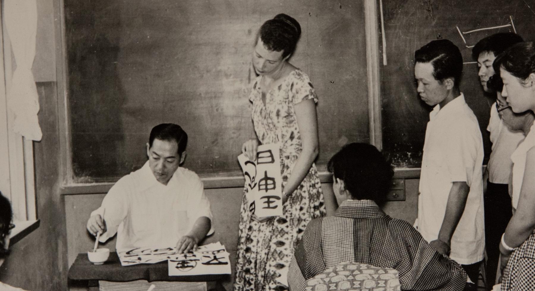 Deborah Remington taught calligraphy to Japanese and American students at the San Francisco Art Institute, soon after her return to the U.S. from Japan. Photo dated Fall 1958.